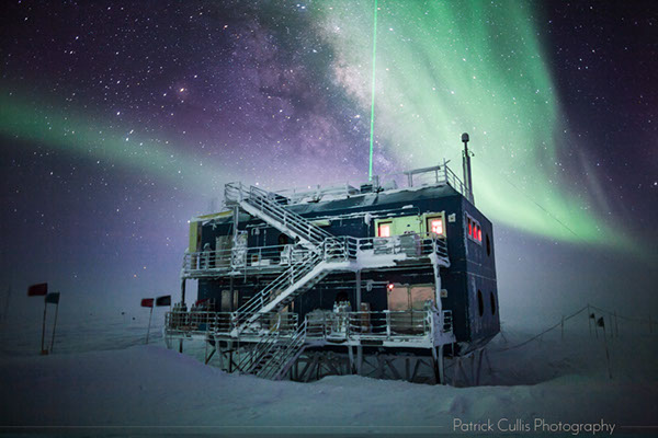 NOAA's ARO building at the South Pole Station aurora and milky way.