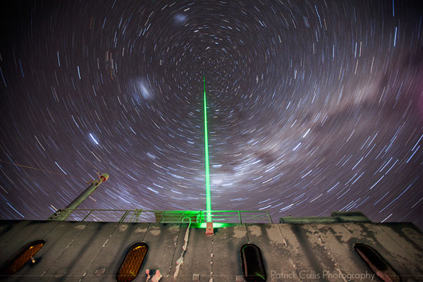 A LIDAR fires toward the southern celestial axis at the Atmospheric Research Observatory at the South Pole, Antarctica.