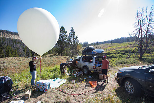 Filling the balloon that will carry cameras in to the shadow of the Great American Eclipse on August 21, 2017 in Wyoming.